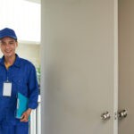 Cheerful Asian Handyman Arriving House